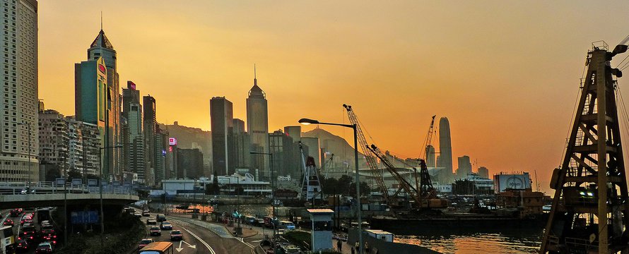 Sunset Causeway Bay Hong Kong." (Public Domain) by Bernard Spragg