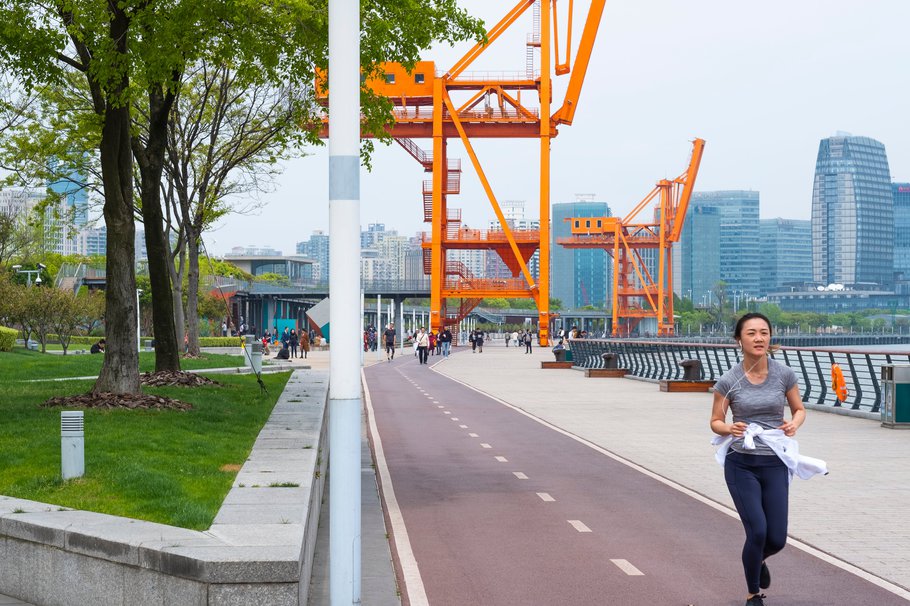 Riverfront path with bicycle track between Long Museum and the West Bund Arts Center in West Bund