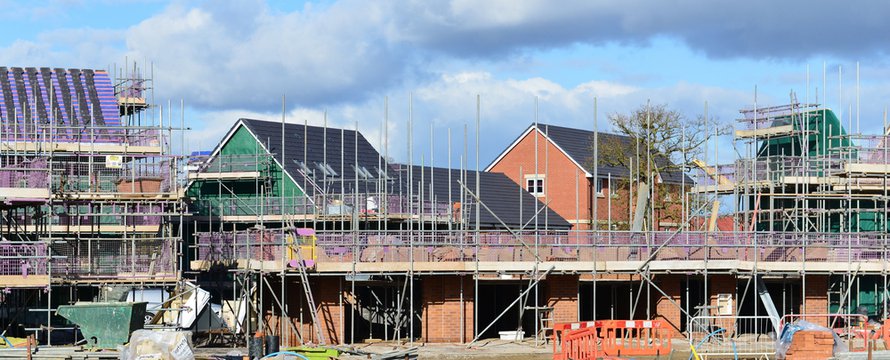 HILPERTON - FEB 21: View of a building site on Feb 21, 2015 in Hilperton, UK. The Wiltshire village is part of the UK's construction boom with the number of new homes being built up 10% since 2013.